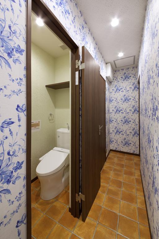 Guesthouse Tiga Kumamoto Rum bild